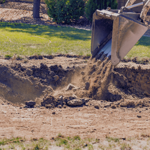 Fill dirt is frequently used to fill in low-lying areas or depressions in land to create a more level surface.
